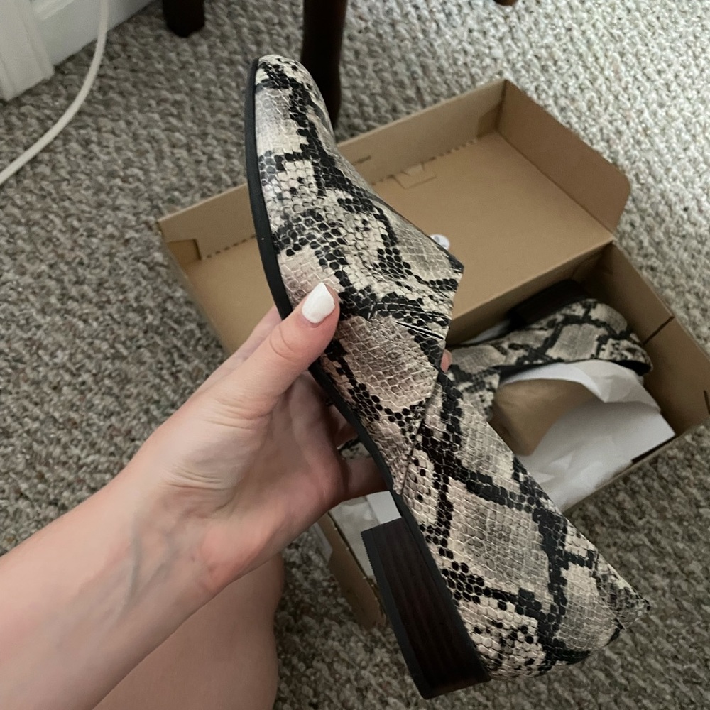 Brand new Clark’s. Size 11 Wide. Snakeskin print